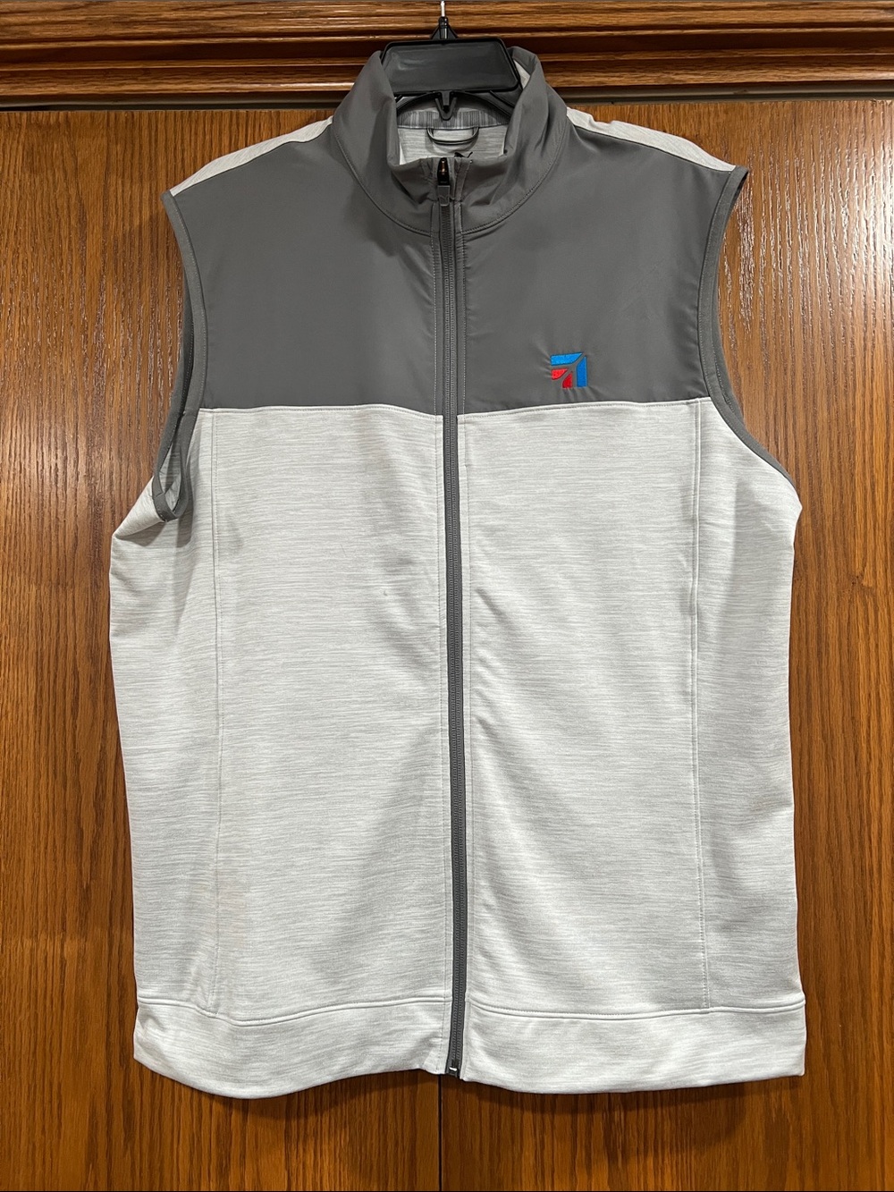 Puma BRANDED Cessna gray vest.